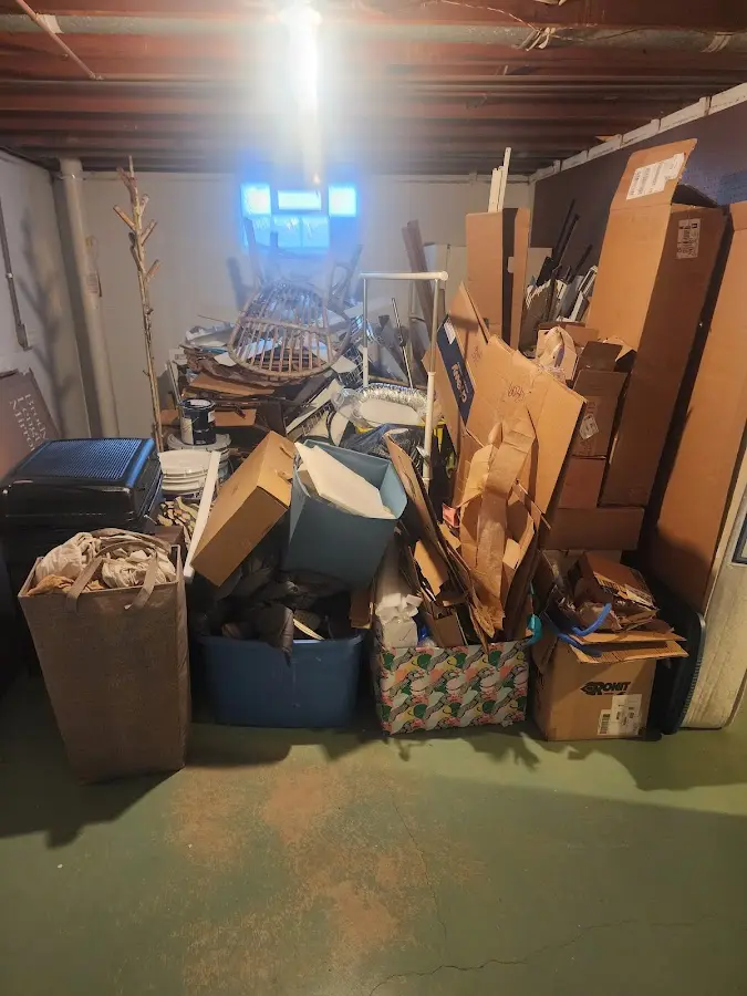 Roll-off dumpster container at job site for Roll Off Dumpster Rental in Brightwaters